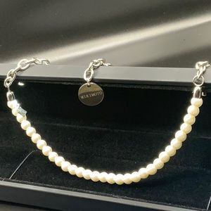 MIKIMOTO, COMME DES GARCONS. NEW @ $2,800.00. I am Selling for $2,000.00.